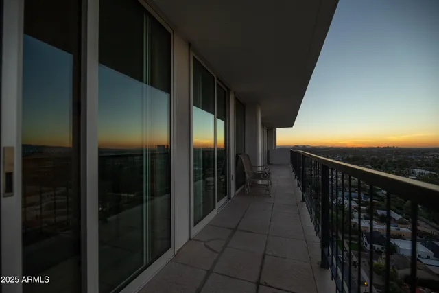 a view of a chairs and tables in the terrace