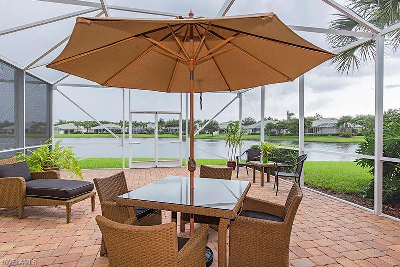 a view of swimming pool with a patio