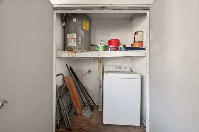 a utility room with a washer and dryer