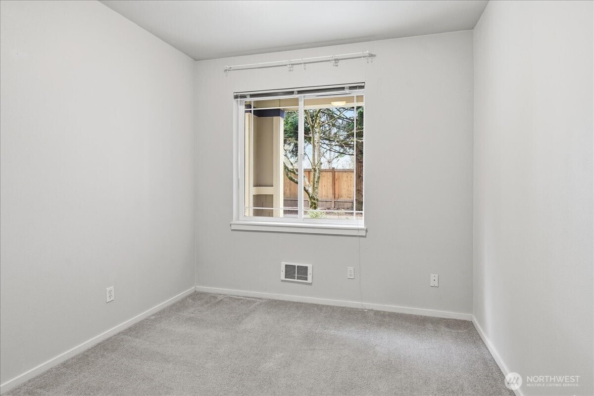 107 164th Street Southeast, Unit 2103 Bothell, WA 98012 - Photo 11 of 24 an empty room with a window