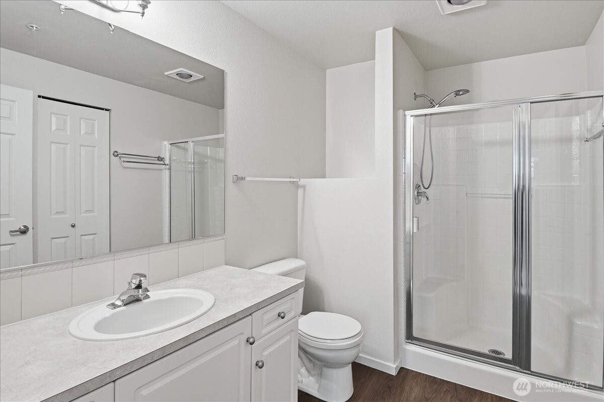 107 164th Street Southeast, Unit 2103 Bothell, WA 98012 - Photo 13 of 24 a bathroom with a sink toilet and shower