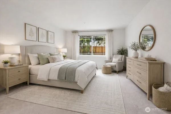 a bedroom with a bed and a dresser