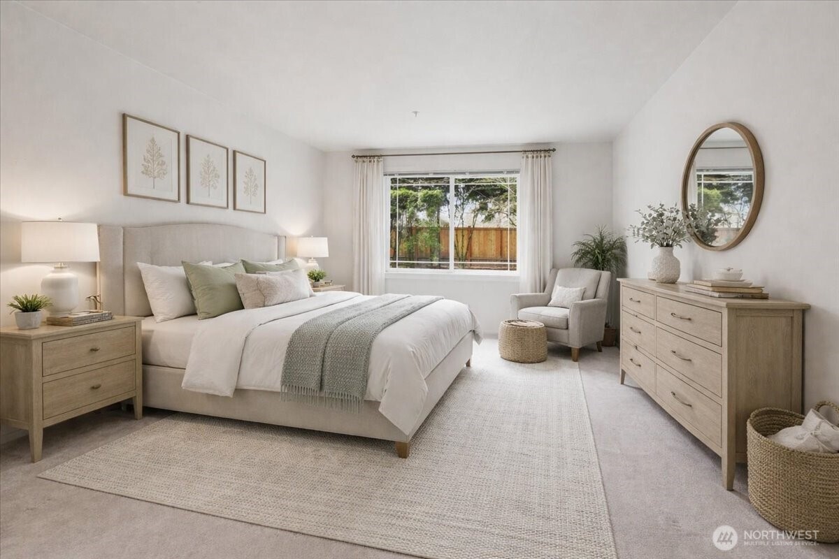 107 164th Street Southeast, Unit 2103 Bothell, WA 98012 - Photo 14 of 24 a bedroom with a bed and a dresser