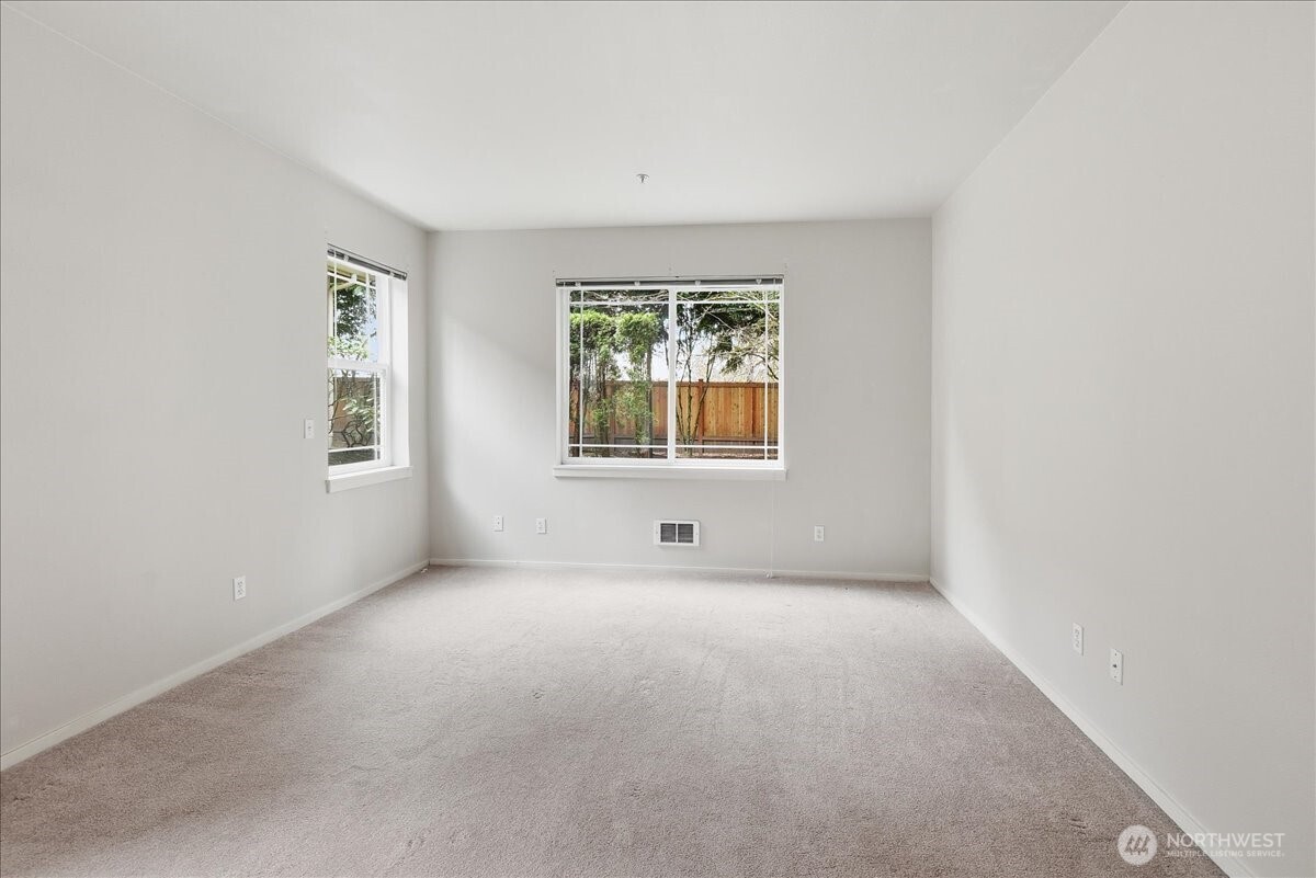 107 164th Street Southeast, Unit 2103 Bothell, WA 98012 - Photo 15 of 24 an empty room with windows