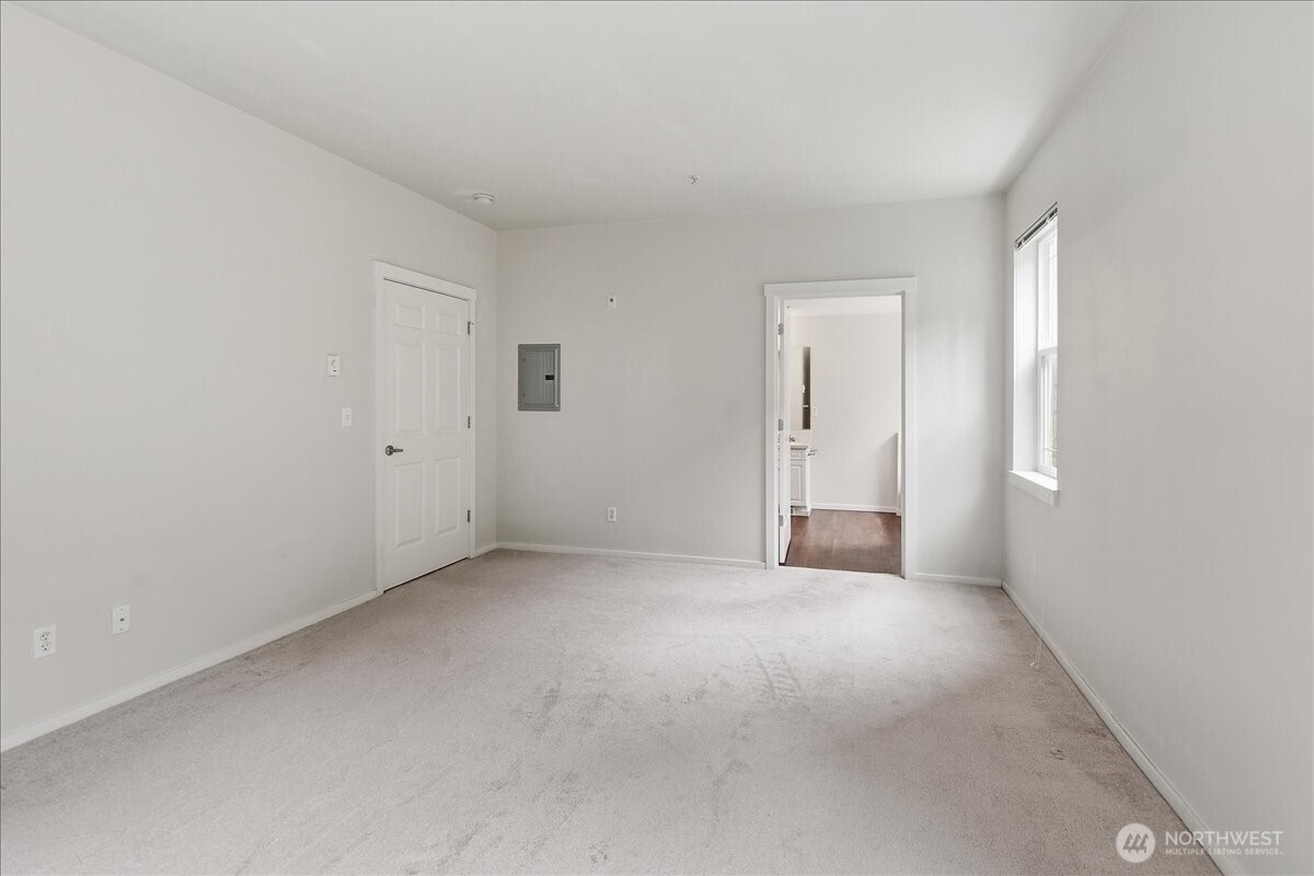 107 164th Street Southeast, Unit 2103 Bothell, WA 98012 - Photo 16 of 24 an empty room with a natural light