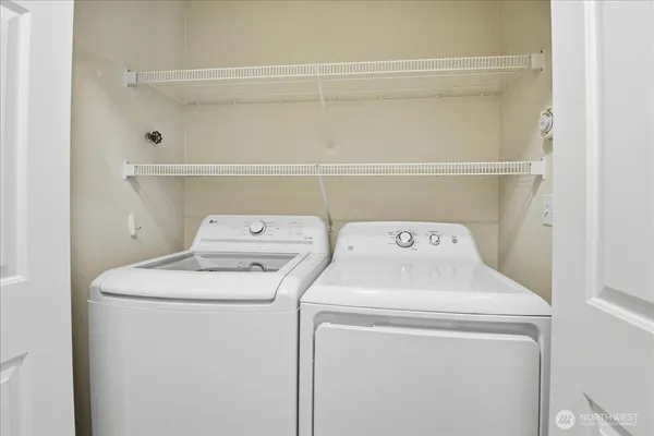 a utility room with dryer and washer