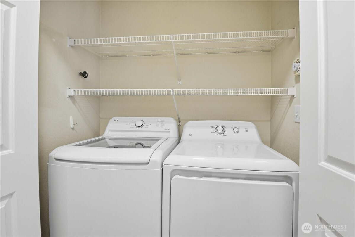 107 164th Street Southeast, Unit 2103 Bothell, WA 98012 - Photo 20 of 24 a utility room with dryer and washer