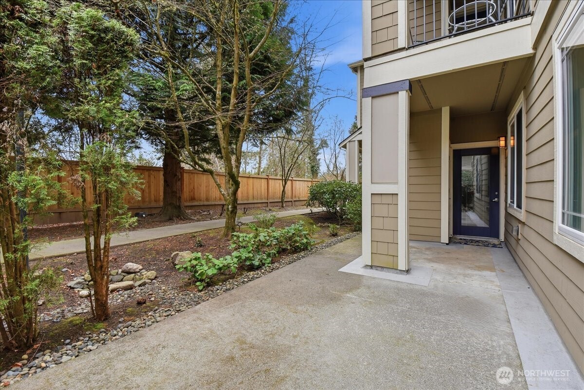 107 164th Street Southeast, Unit 2103 Bothell, WA 98012 - Photo 22 of 24 a view of a house with a street