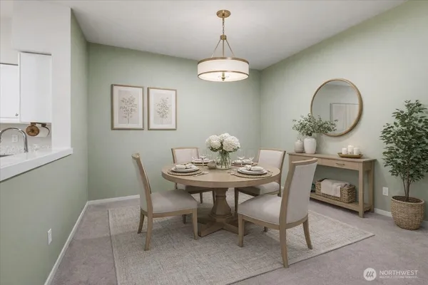 a view of a dining room with furniture