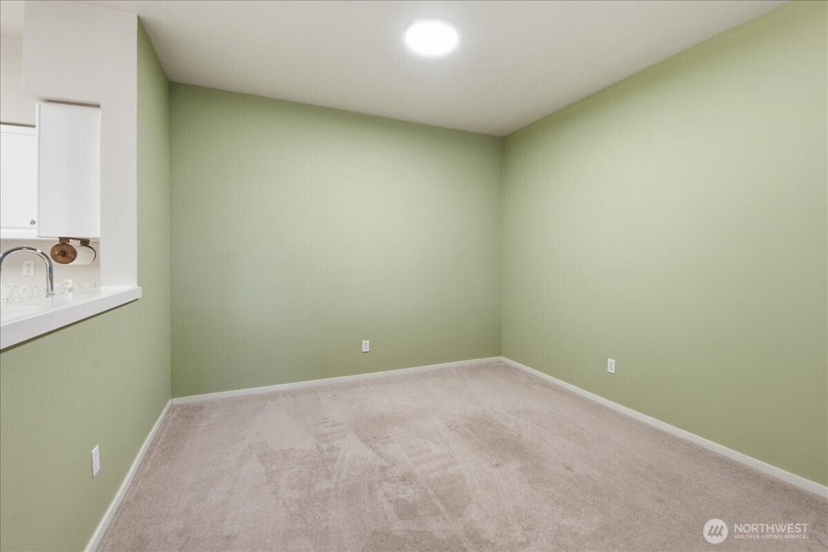 107 164th Street Southeast, Unit 2103 Bothell, WA 98012 - Photo 9 of 24 a view of a room with rack on the wall