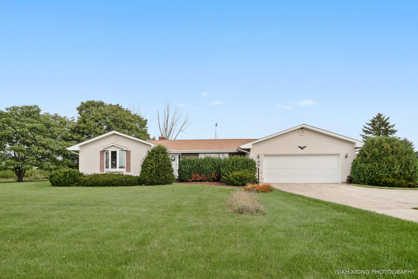 45W702 Wheeler Road Sugar Grove, IL 60554 - Photo 1 of 49 a front view of house with yard and green space