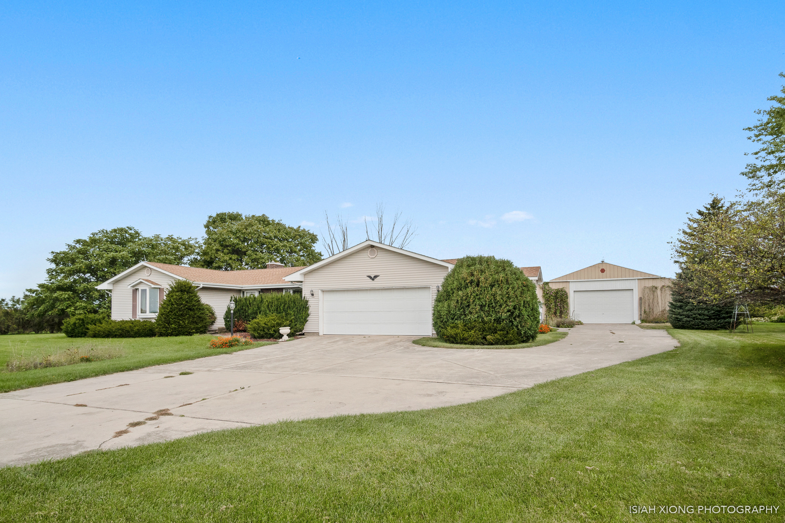 45W702 Wheeler Road Sugar Grove, IL 60554 - Photo 2 of 49 a front view of a house with a yard