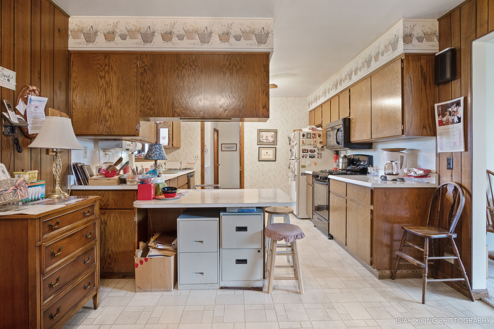 45W702 Wheeler Road Sugar Grove, IL 60554 - Photo 18 of 49 a kitchen with cabinets and chairs