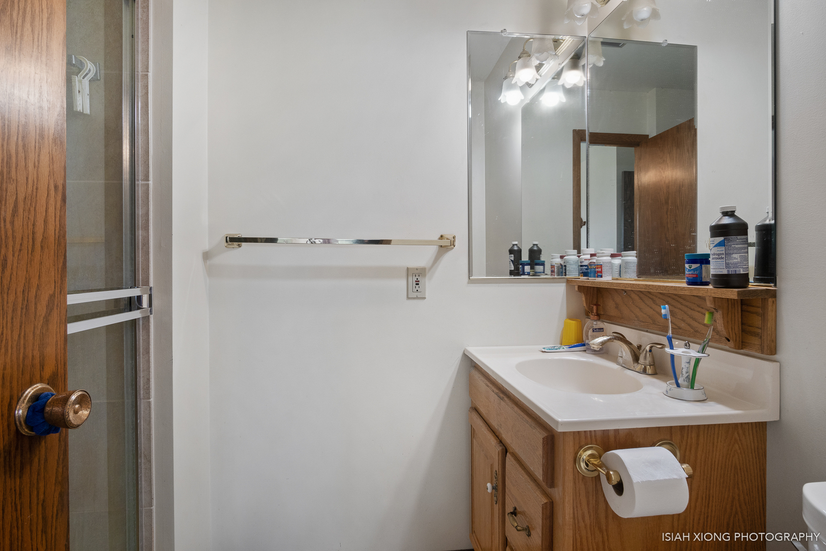 45W702 Wheeler Road Sugar Grove, IL 60554 - Photo 30 of 49 a bathroom with a sink vanity and a mirror