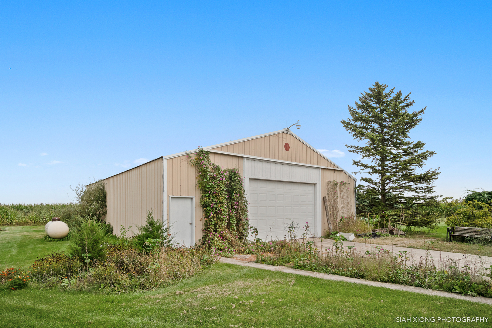45W702 Wheeler Road Sugar Grove, IL 60554 - Photo 36 of 49 a view of an house with backyard space and garden