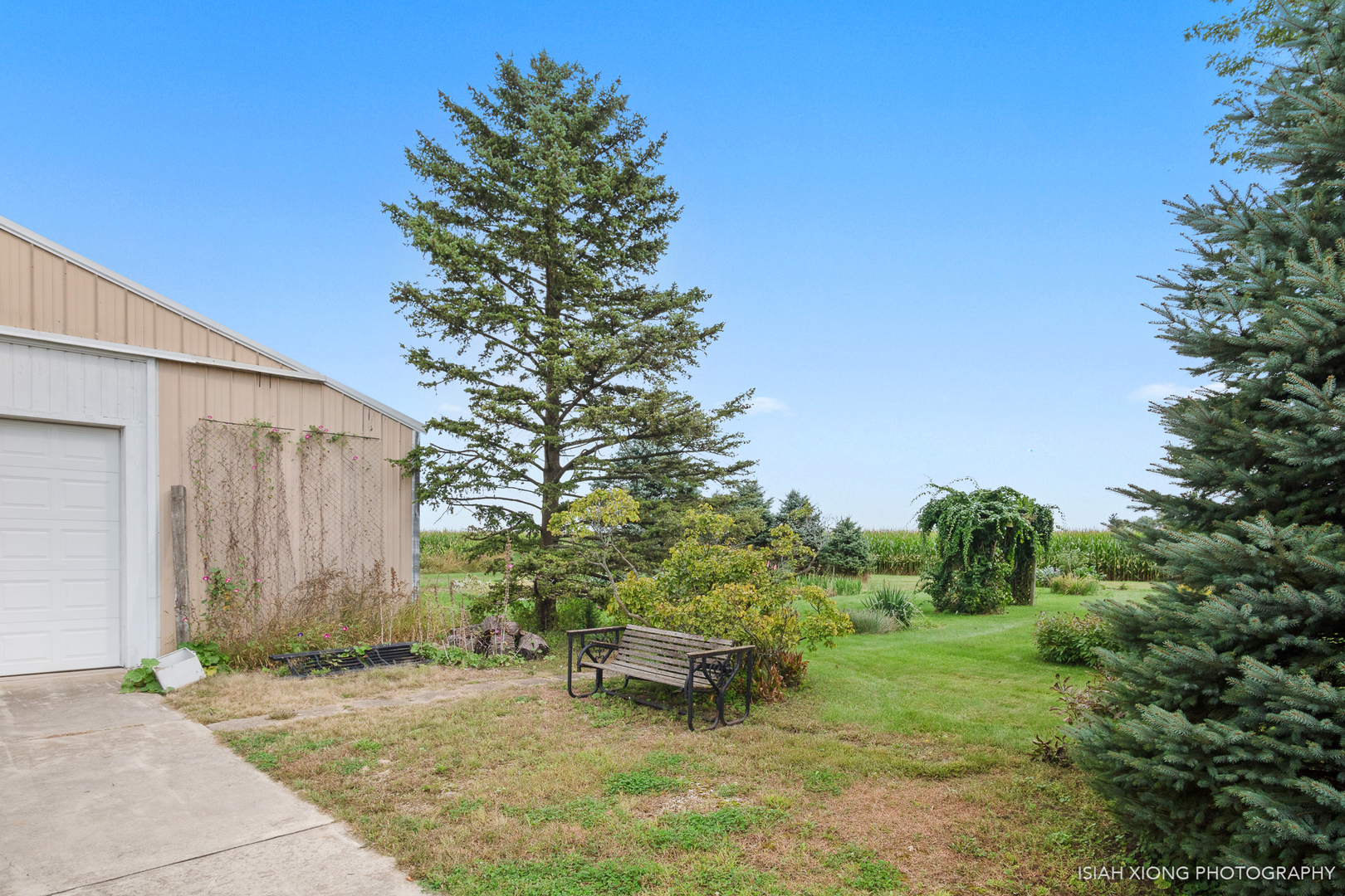 45W702 Wheeler Road Sugar Grove, IL 60554 - Photo 37 of 49 a view of a backyard with a garden and entertaining space