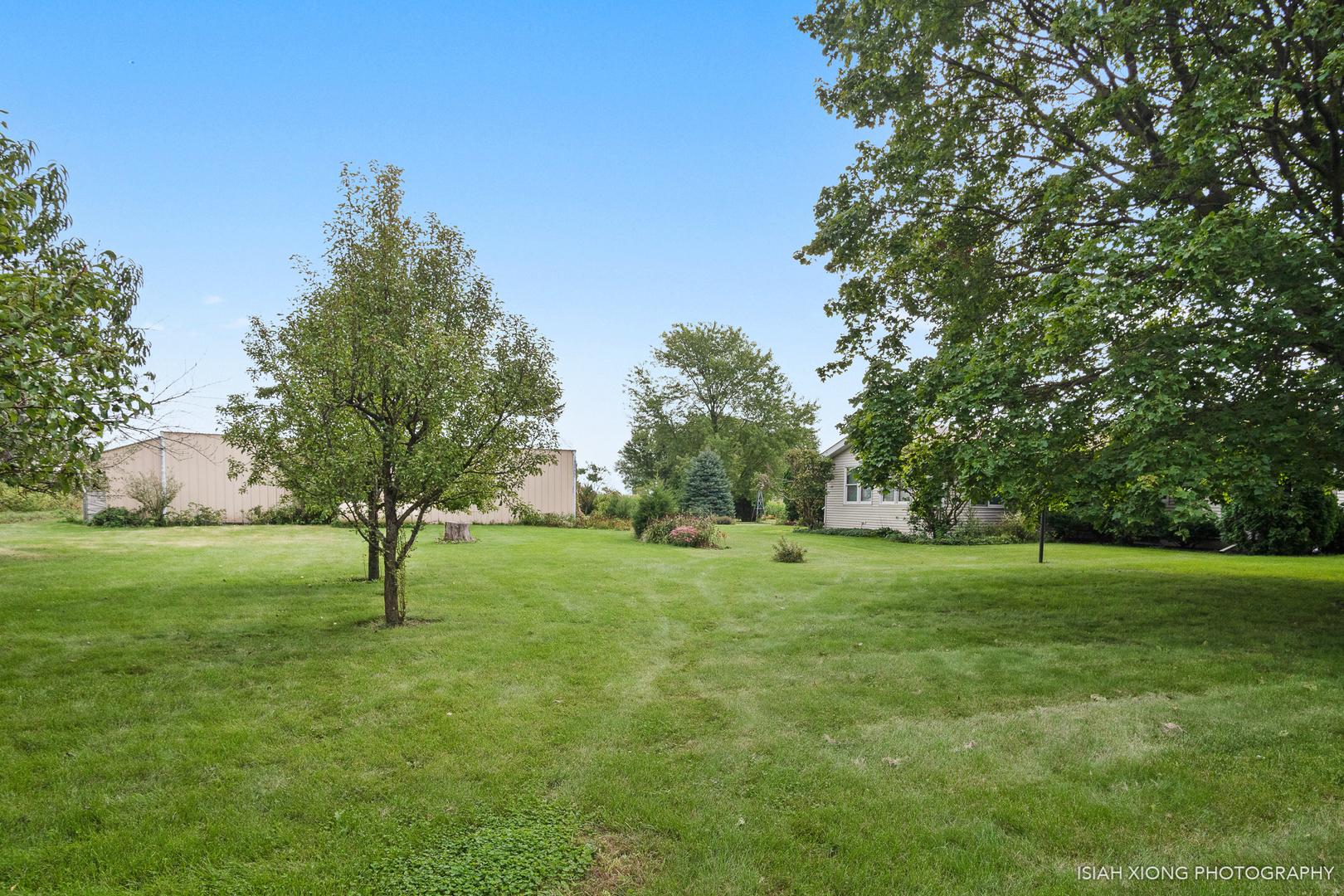 45W702 Wheeler Road Sugar Grove, IL 60554 - Photo 40 of 49 a view of grassy field with trees