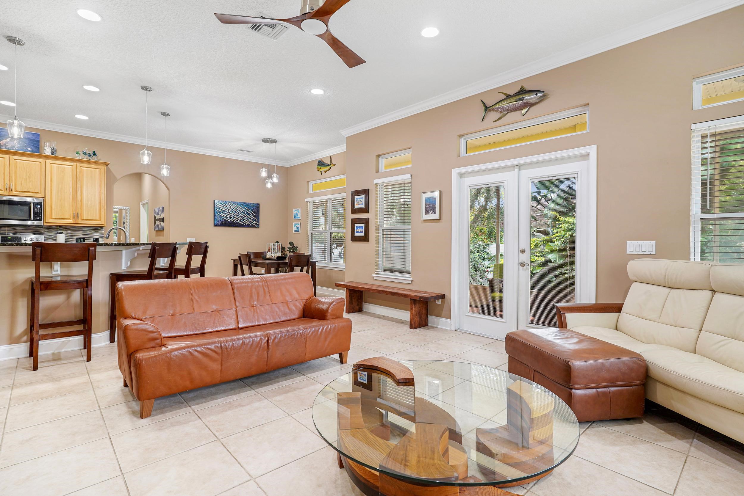 509 Twentieth Street St. Augustine, FL 32084 - Photo 12 of 40 a living room with furniture and a dining table