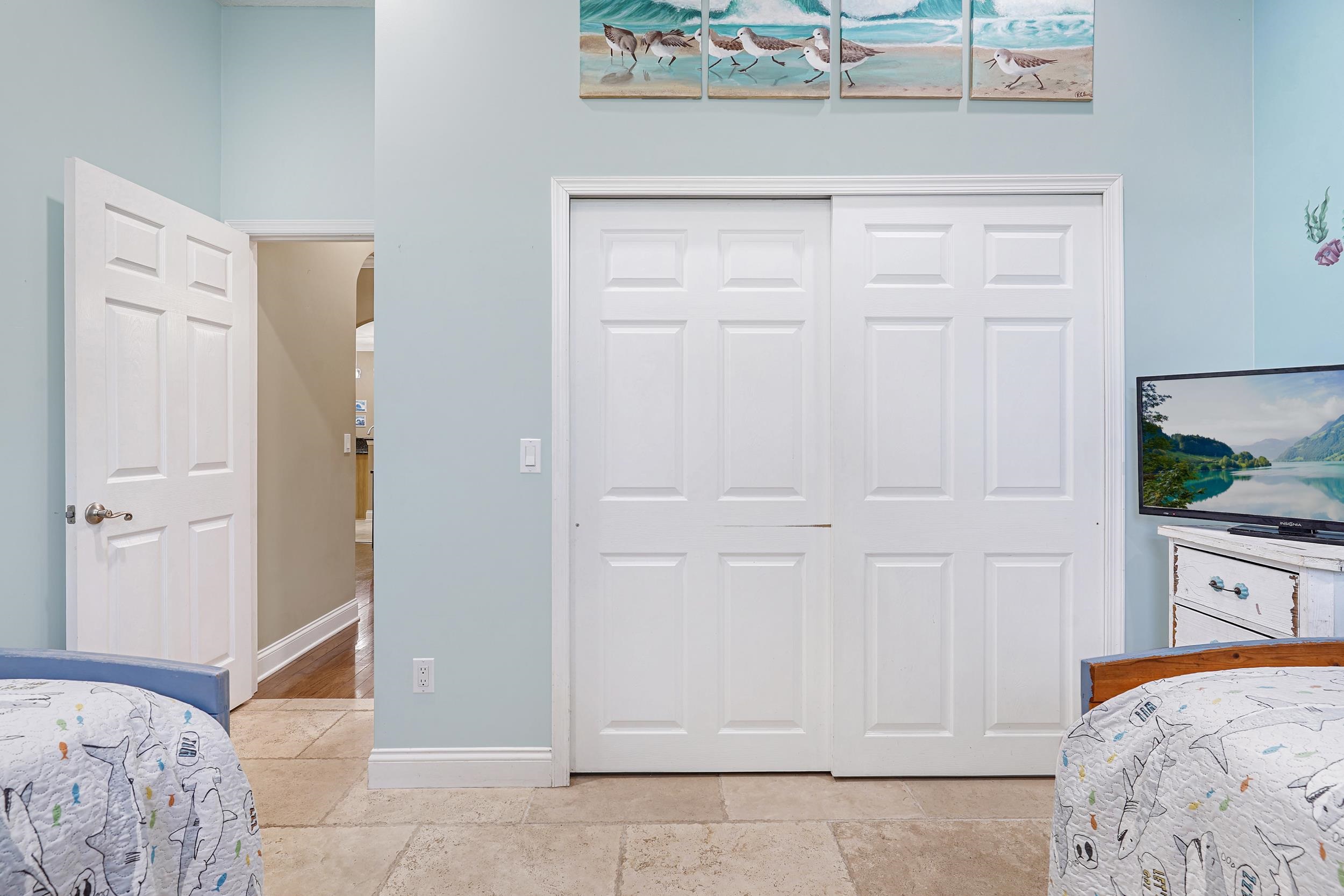 509 Twentieth Street St. Augustine, FL 32084 - Photo 25 of 40 a bedroom with a bed and a dresser