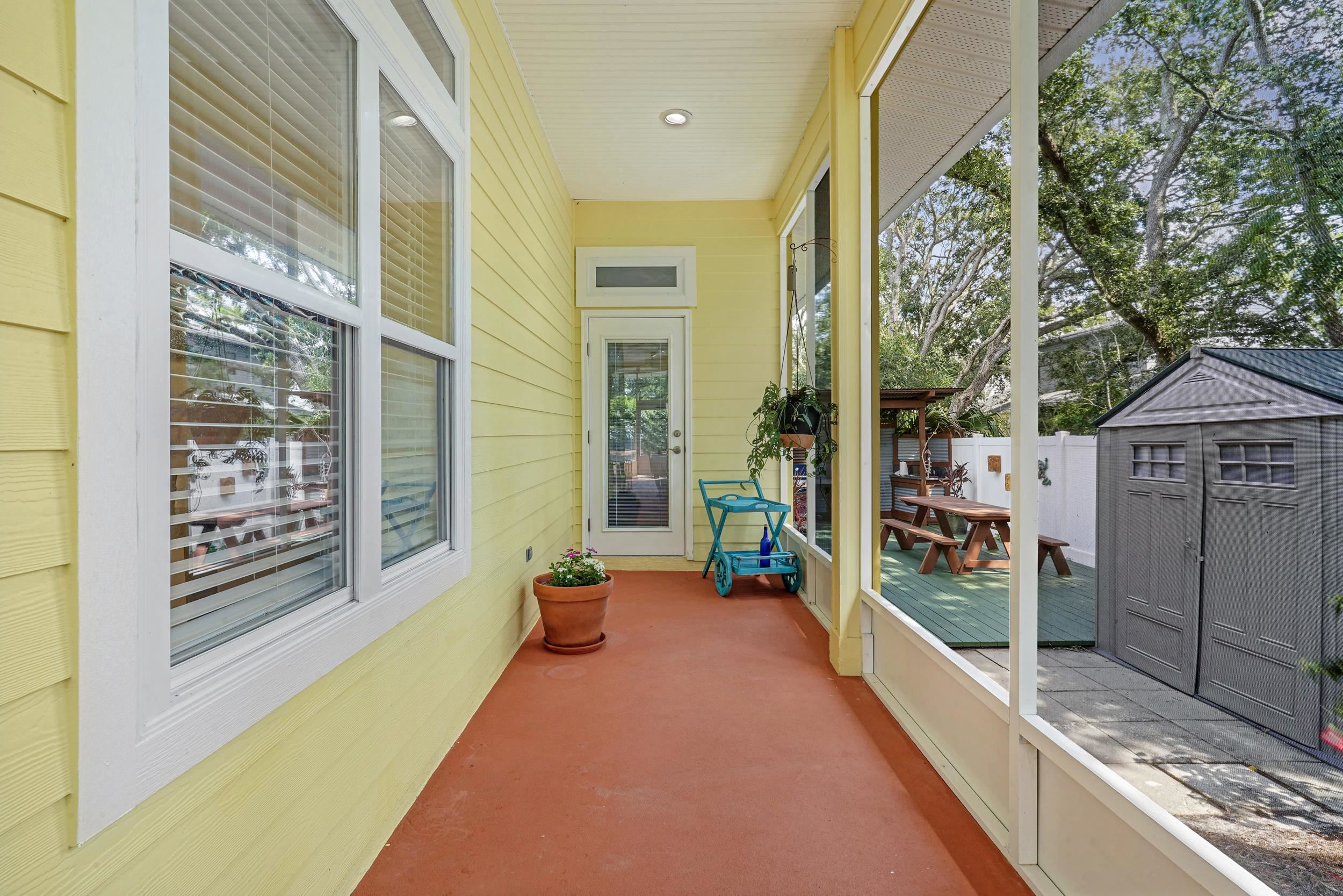 509 Twentieth Street St. Augustine, FL 32084 - Photo 36 of 40 a balcony with furniture and outdoor seating