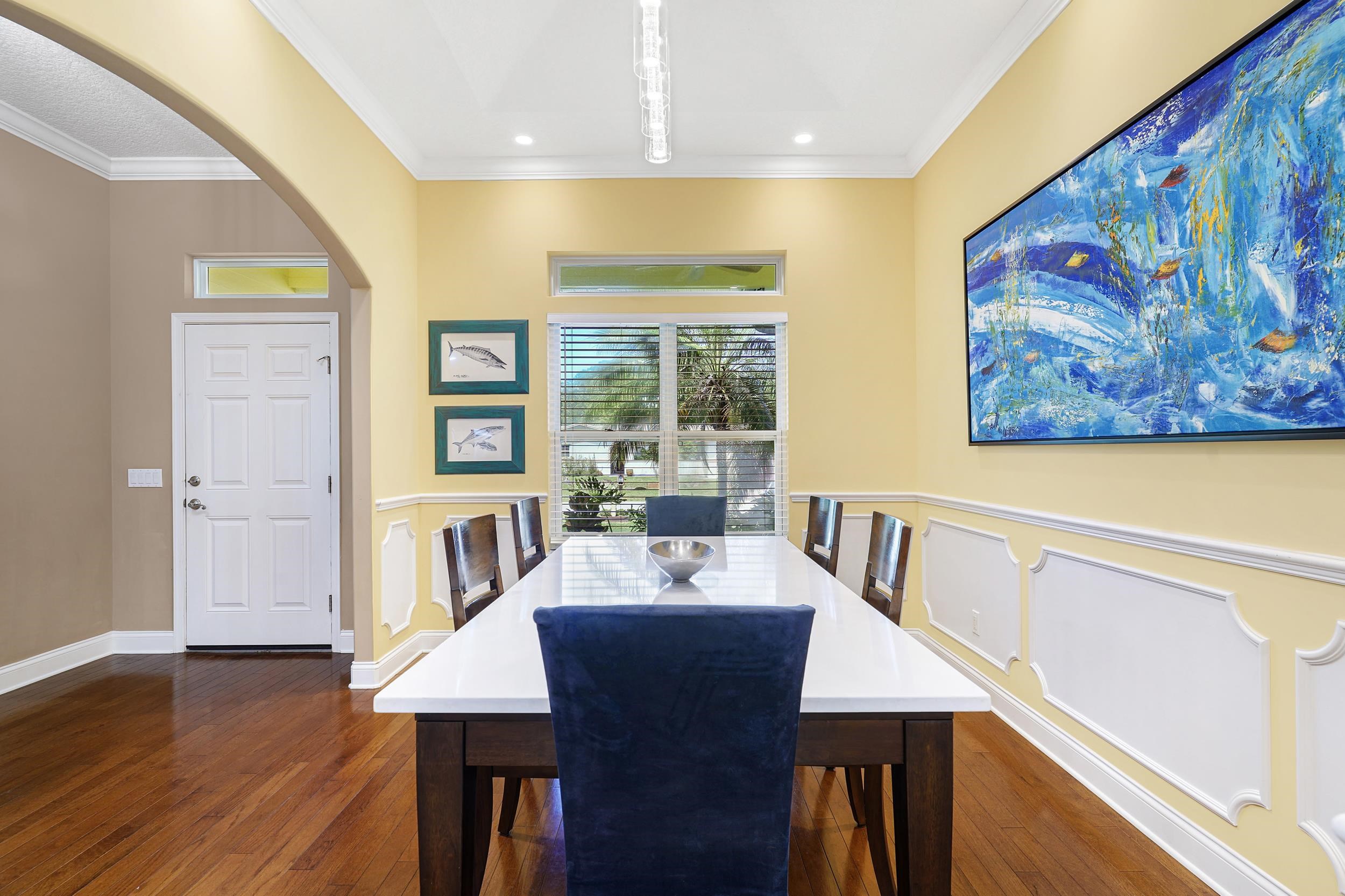 509 Twentieth Street St. Augustine, FL 32084 - Photo 9 of 40 a view of a dining room with furniture window and wooden floor