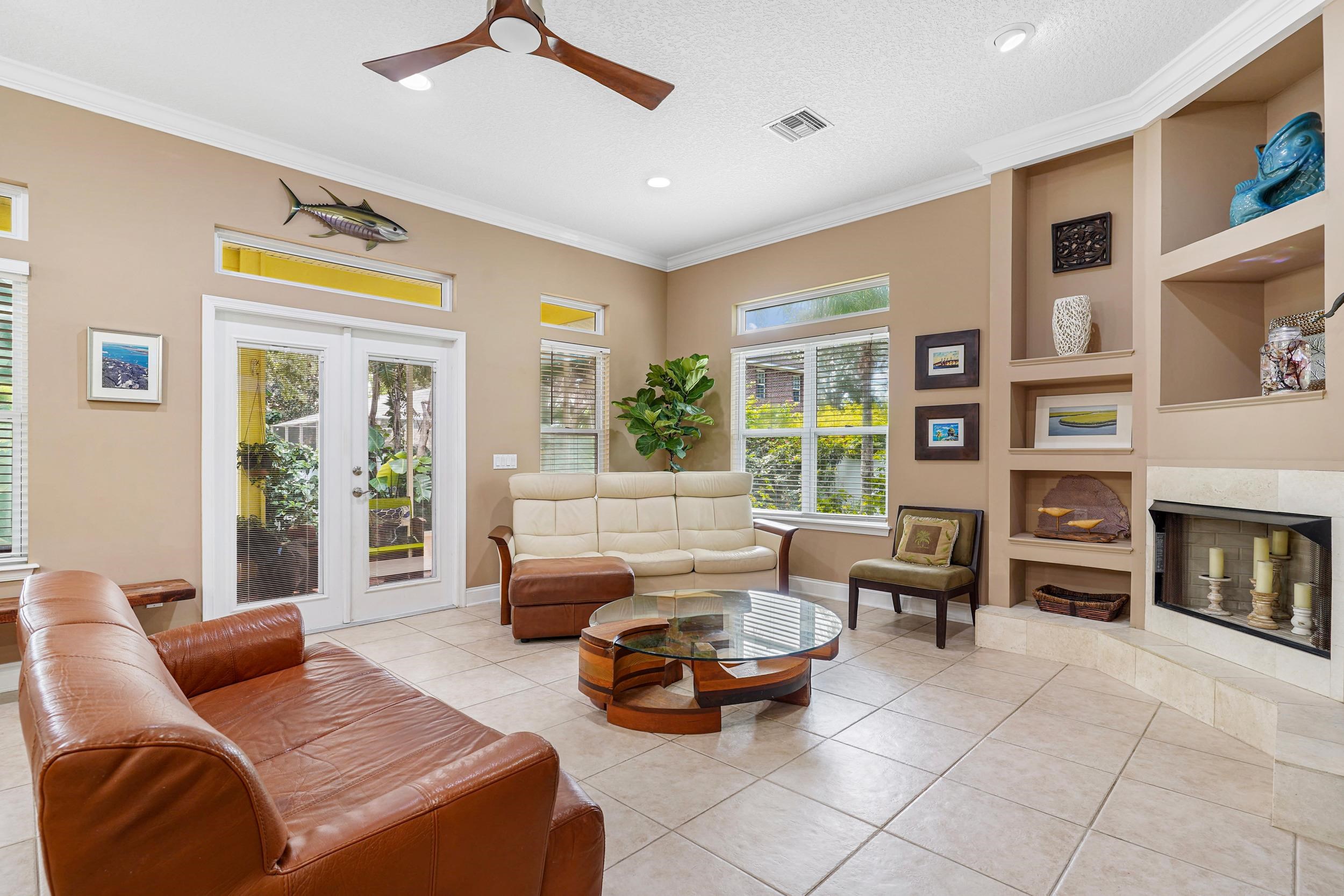 509 Twentieth Street St. Augustine, FL 32084 - Photo 10 of 40 a living room with furniture and a fireplace