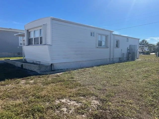 a view of a lake with outdoor space
