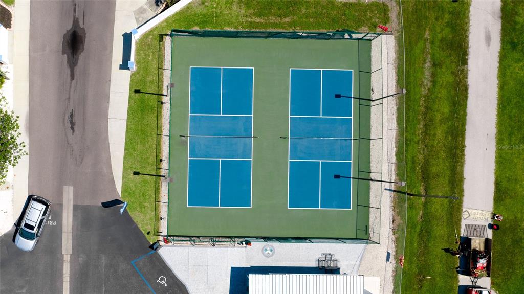 10315 Cortez Road West, Unit 15G Bradenton, FL 34210 - Photo 50 of 77 an aerial view of a house with a yard