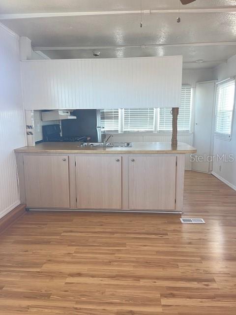 10315 Cortez Road West, Unit 15G Bradenton, FL 34210 - Photo 8 of 77 a kitchen with stainless steel appliances granite countertop a sink and cabinets