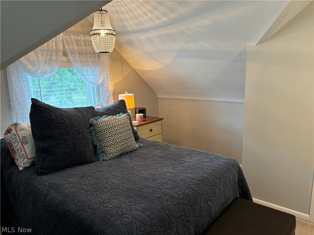 1440 West Miner Road Cleveland, OH 44124 - Photo 35 of 49 Bedroom with carpet floors and lofted ceiling