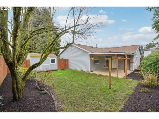 a backyard of a house with seating space