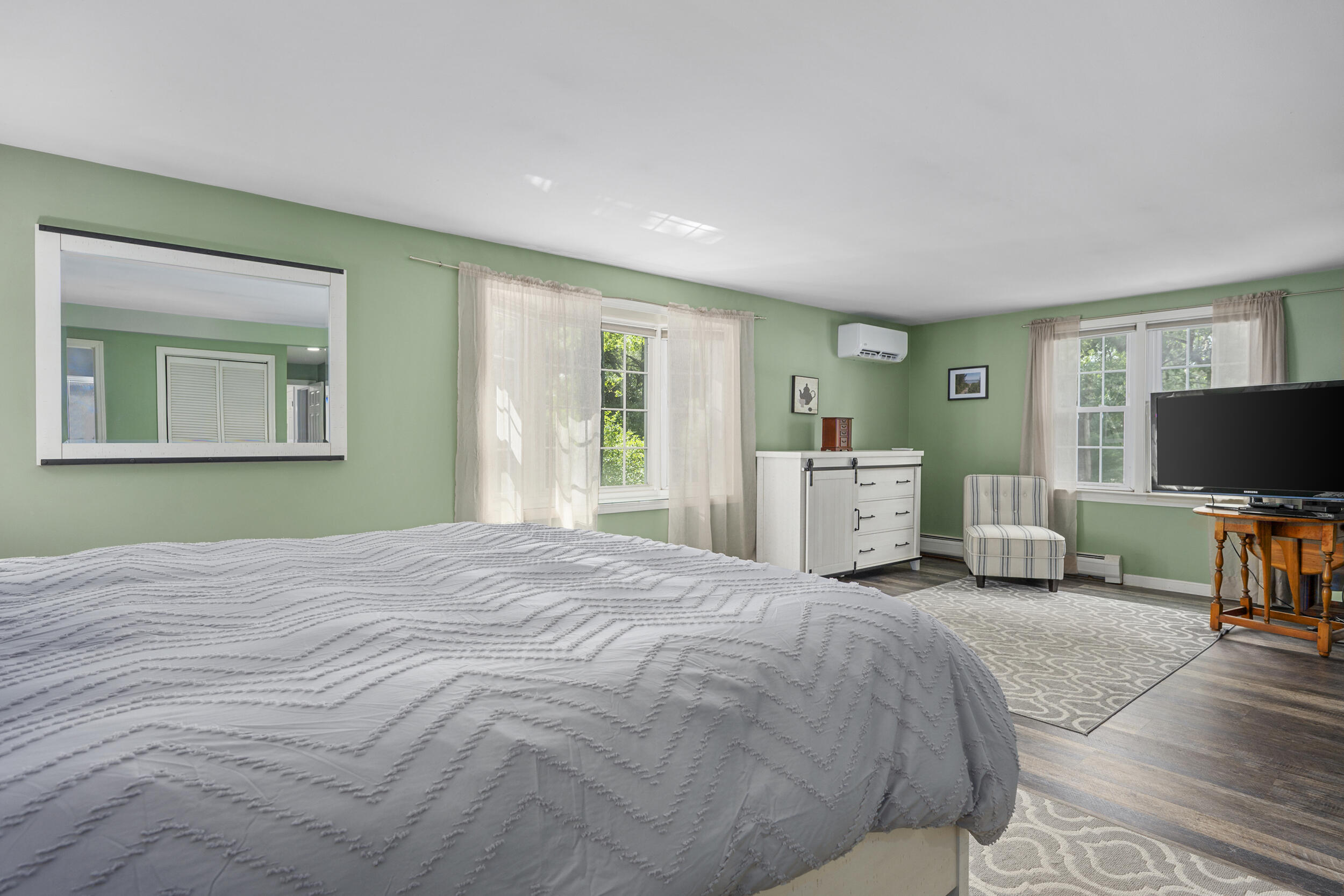 65 Hadrada Lane Centerville, MA 02632 - Photo 11 of 29 a bedroom with a bed and a flat screen tv