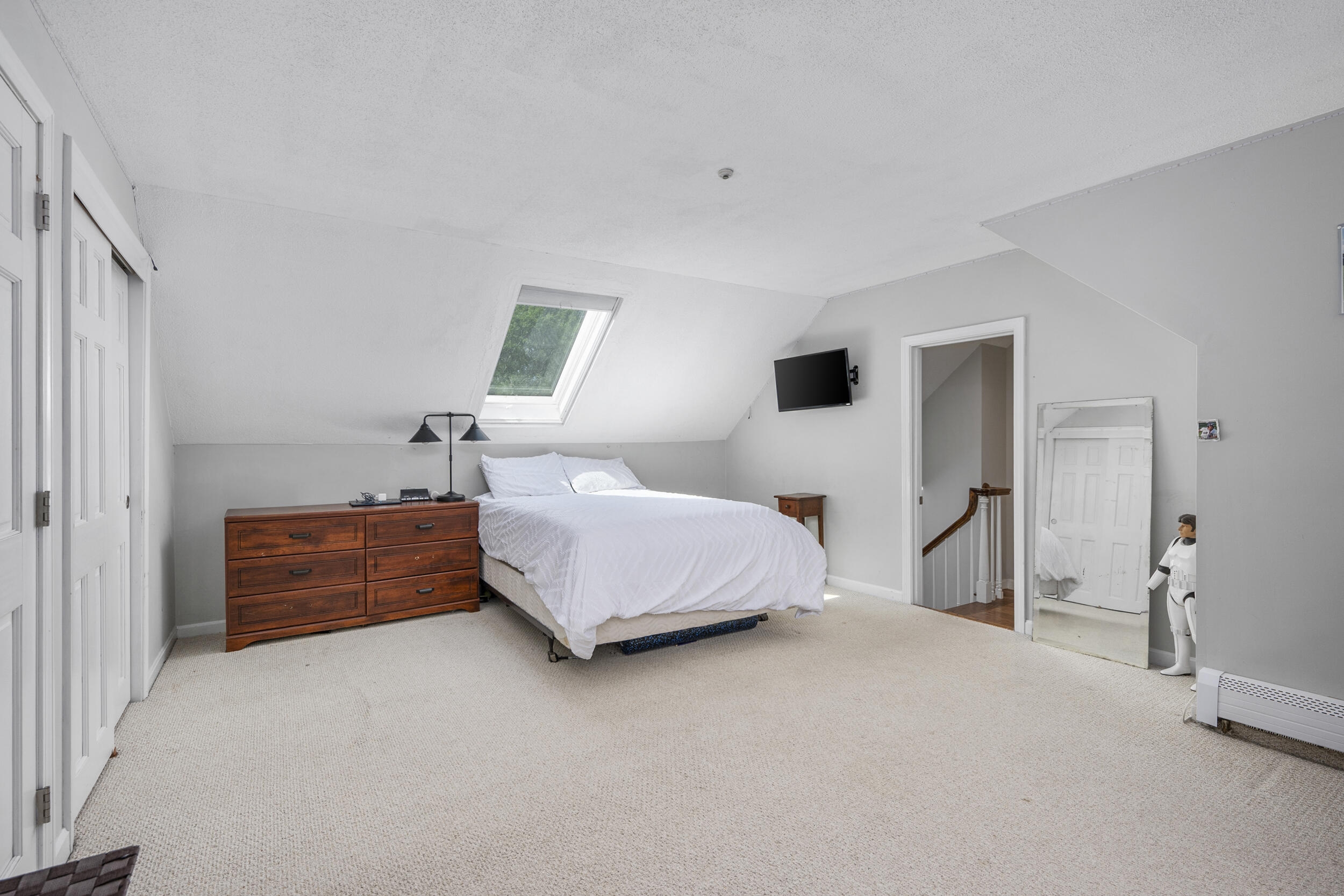 65 Hadrada Lane Centerville, MA 02632 - Photo 16 of 29 a bedroom with a bed and a night stand