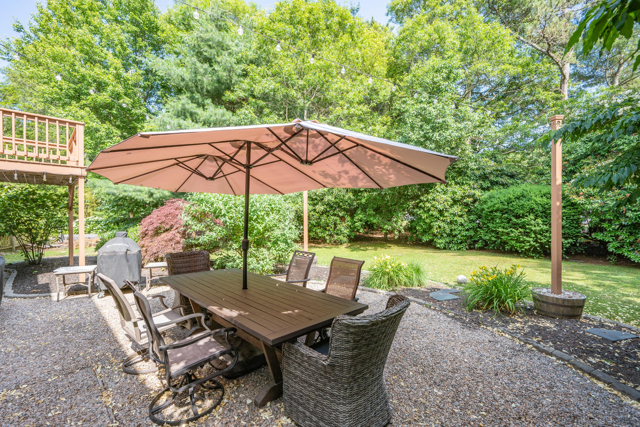 65 Hadrada Lane Centerville, MA 02632 - Photo 24 of 29 a view of a patio with furniture and wooden floor