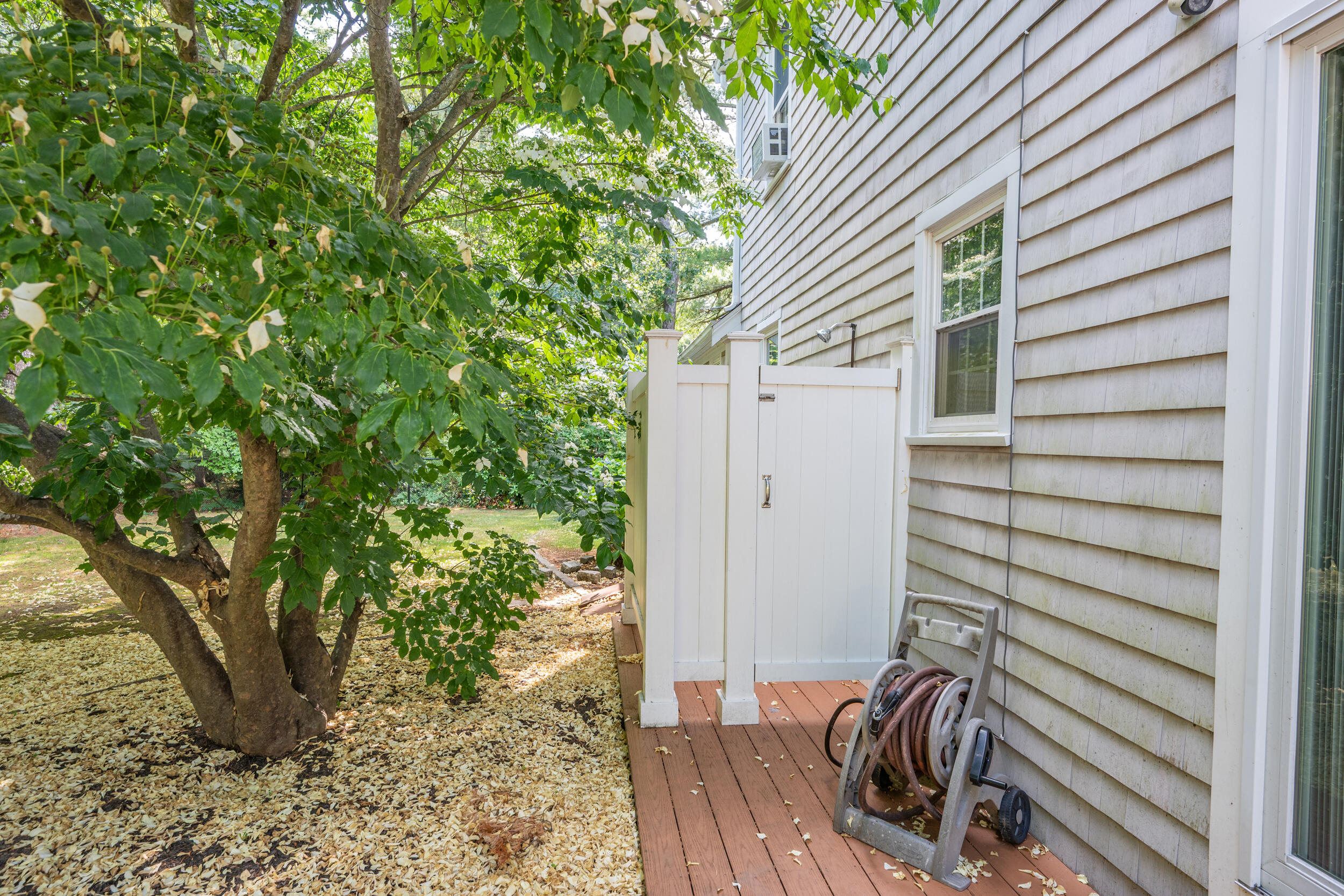 65 Hadrada Lane Centerville, MA 02632 - Photo 25 of 29 a view of a backyard with sitting area