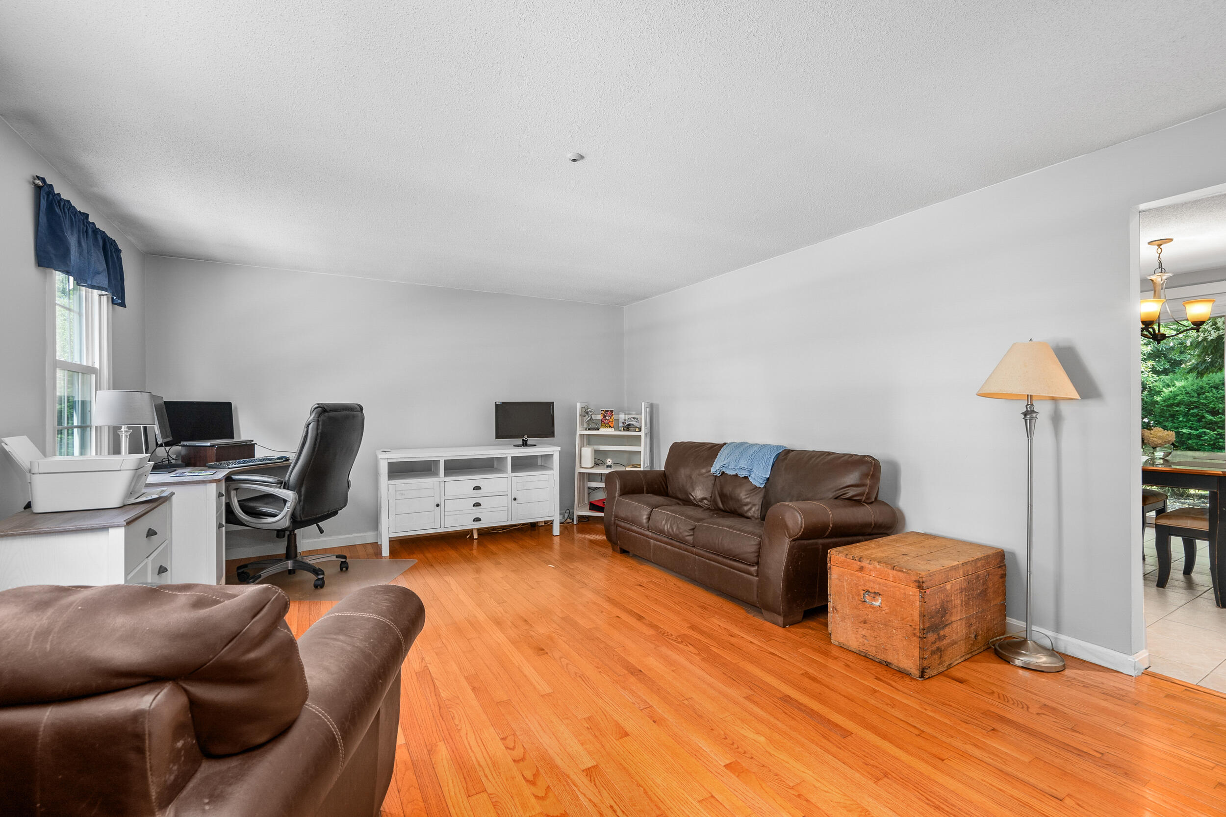 65 Hadrada Lane Centerville, MA 02632 - Photo 6 of 29 a living room with furniture and a wooden floor