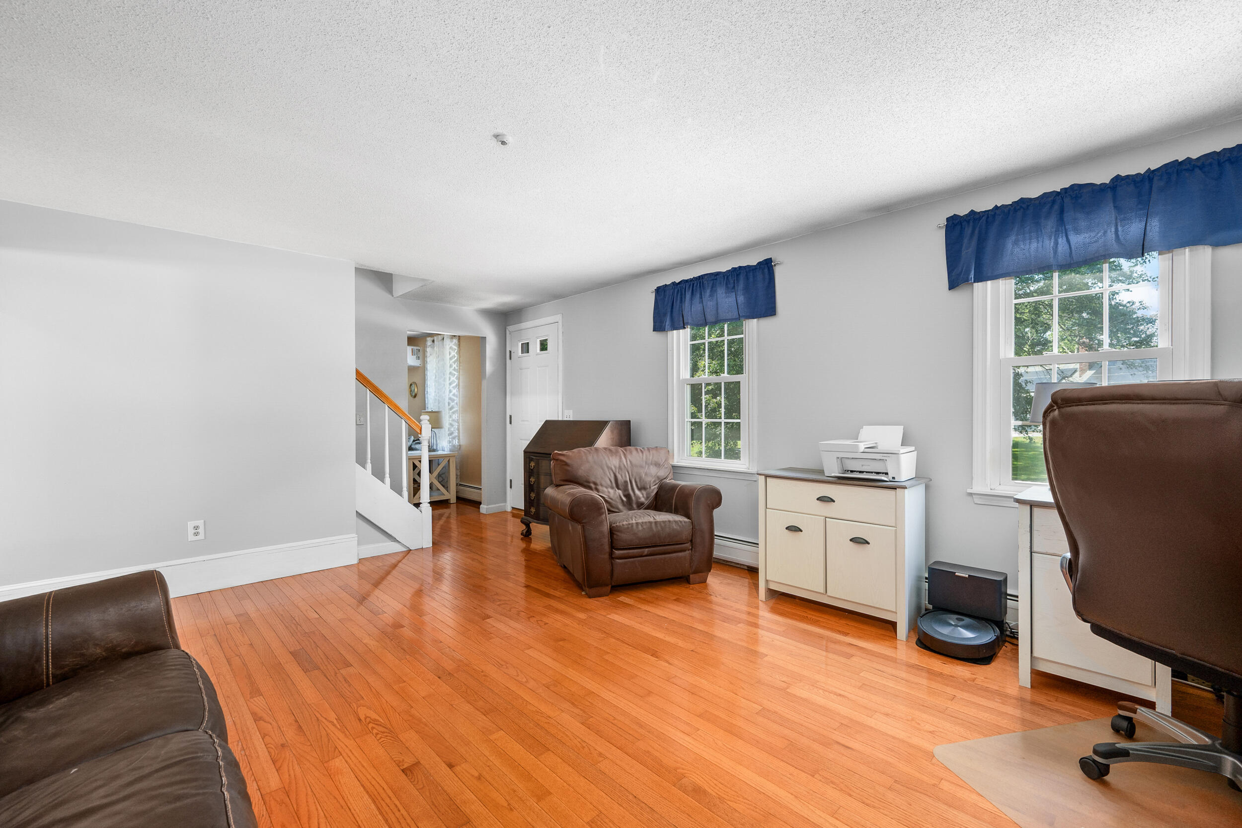 65 Hadrada Lane Centerville, MA 02632 - Photo 7 of 29 a bedroom with furniture and a wooden floor