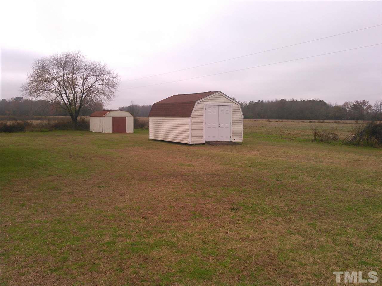 801 Meadowlark Road Dunn, NC 28334 - Photo 22 of 22 a view of a large body of water with a building in the background