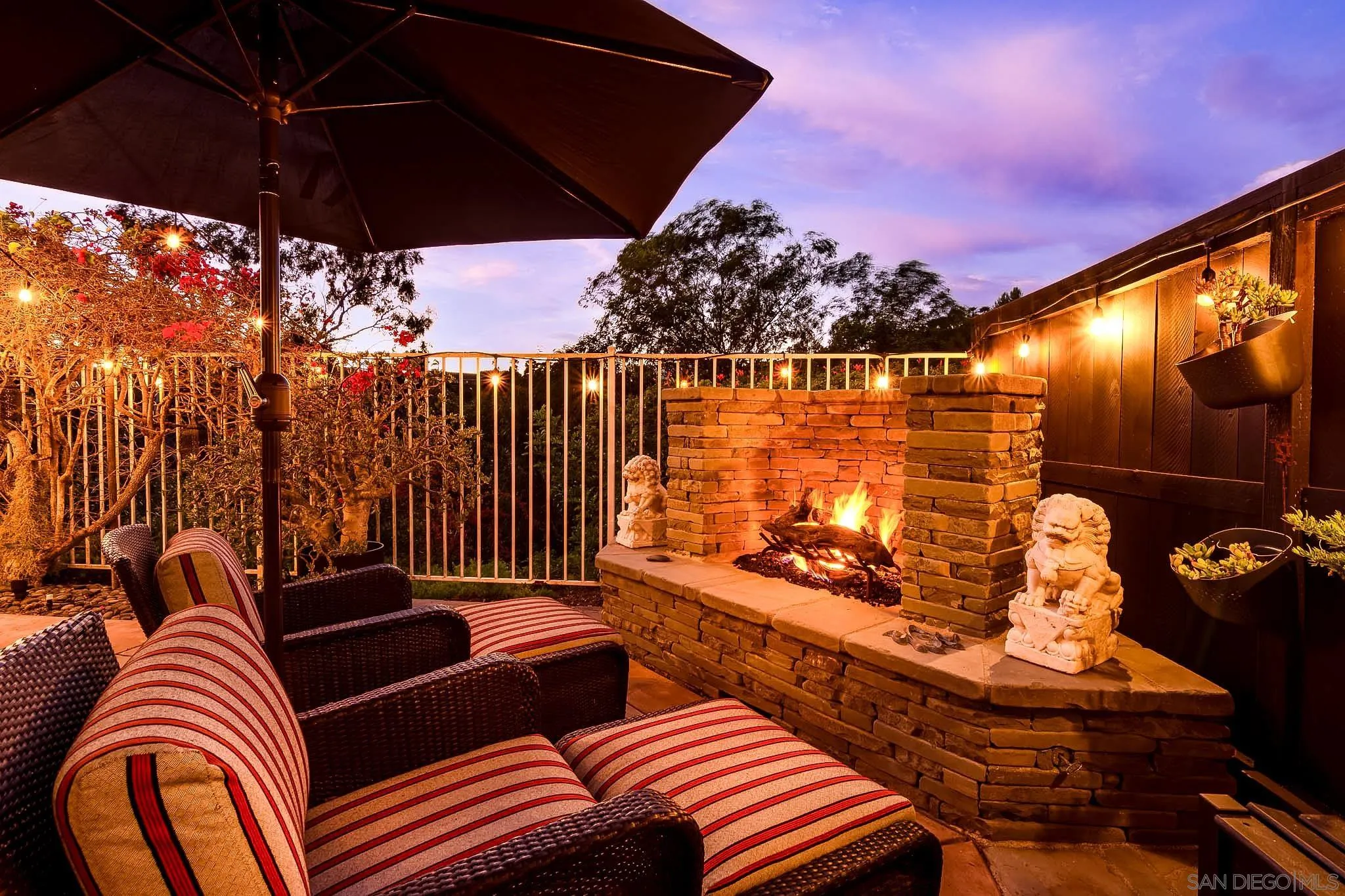 1490 Caminito Solidago La Jolla, CA 92037 - Photo 1 of 31 a view of a balcony with two chairs and a potted plant