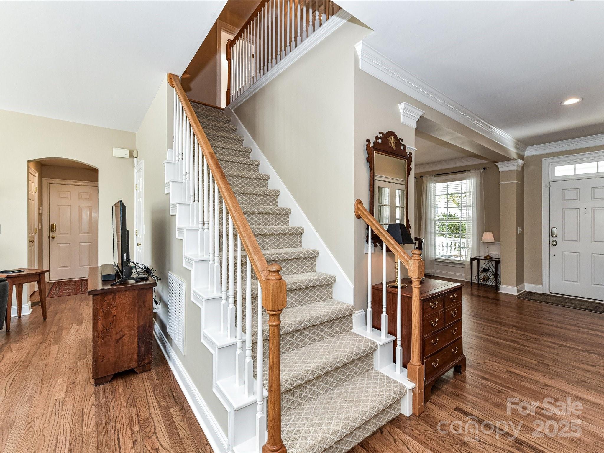 238 Fairview Lane Davidson, NC 28036 - Photo 17 of 40 a view of entryway and hall with wooden floor