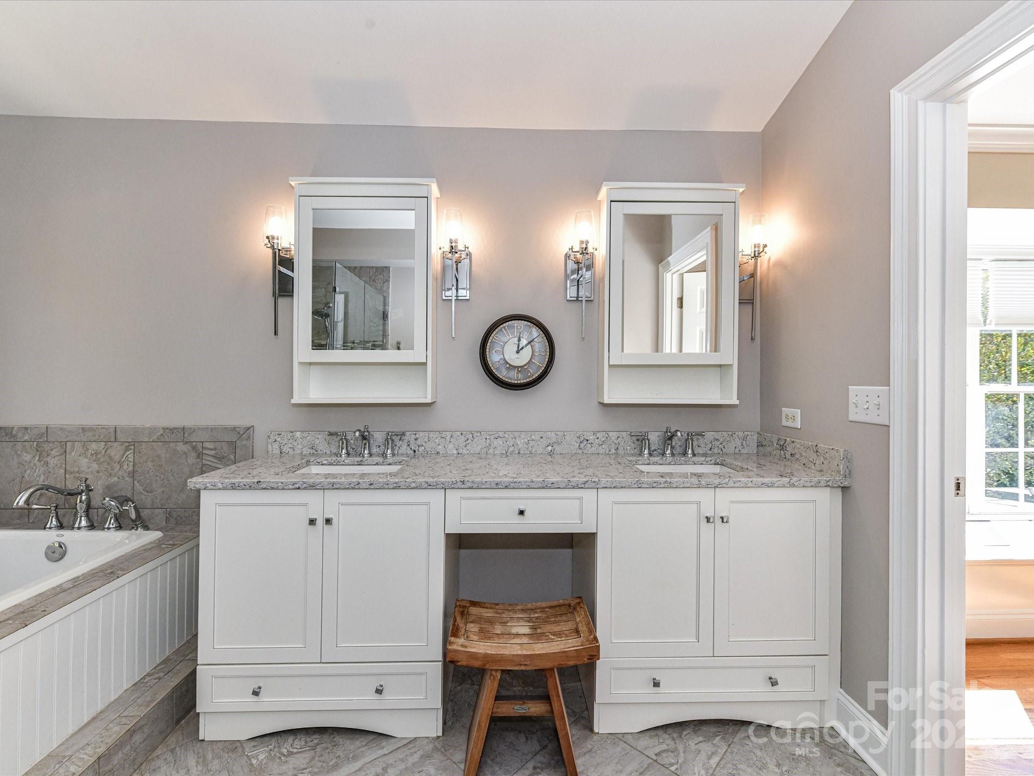 238 Fairview Lane Davidson, NC 28036 - Photo 21 of 40 a bathroom with a sink and a mirror