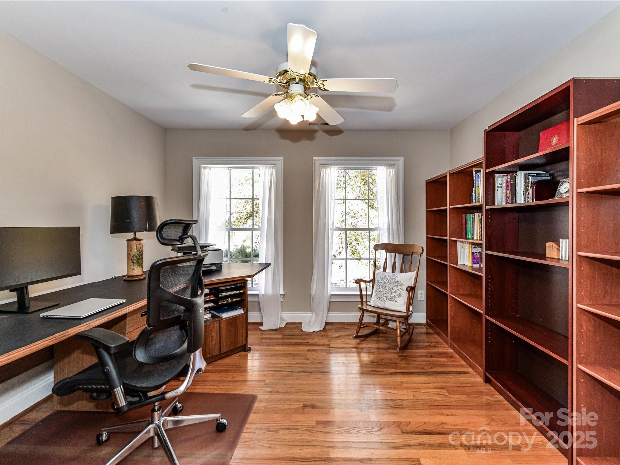 238 Fairview Lane Davidson, NC 28036 - Photo 22 of 40 a view of a workspace with furniture and a window