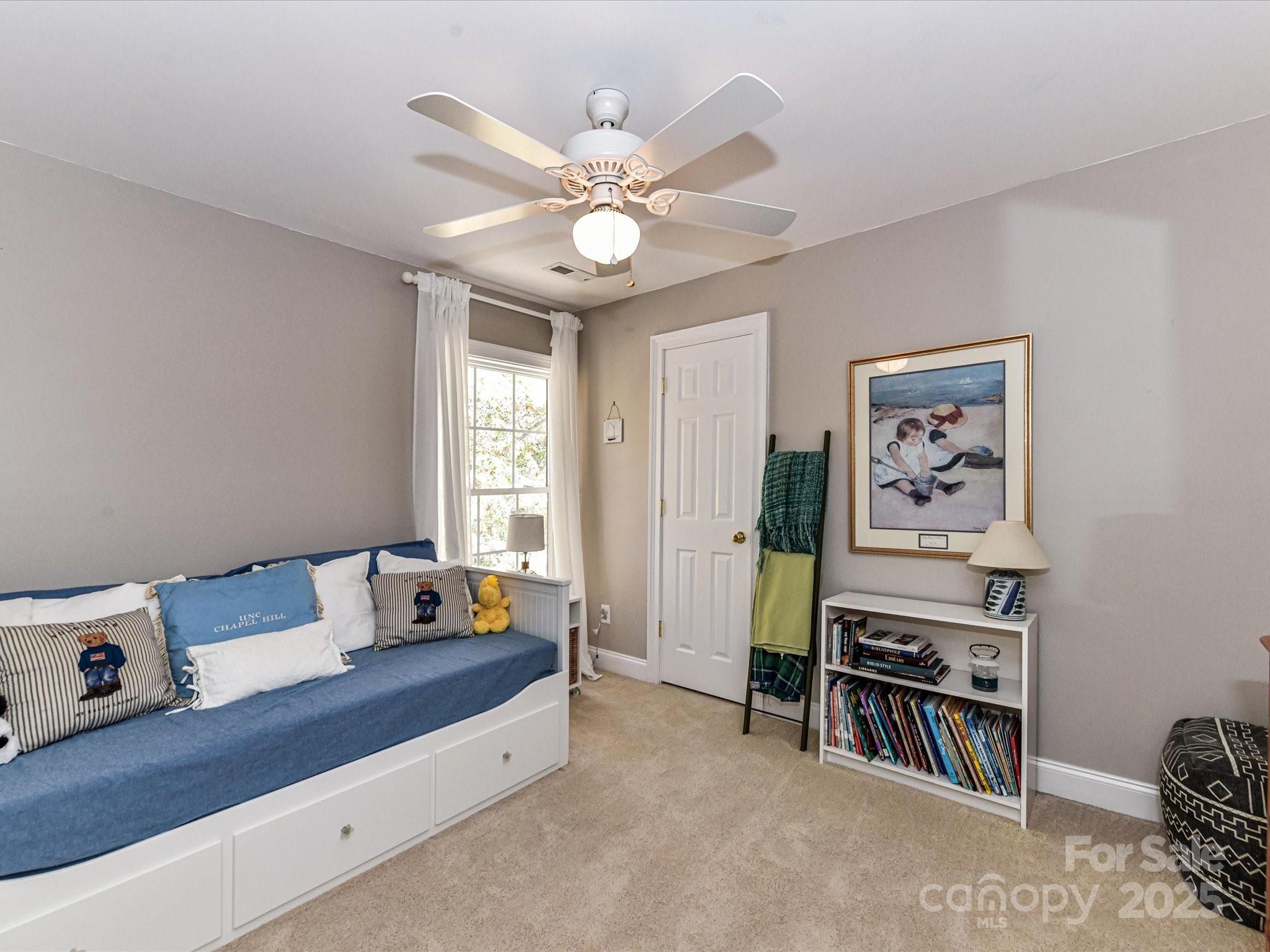 238 Fairview Lane Davidson, NC 28036 - Photo 26 of 40 a bedroom with furniture and a window
