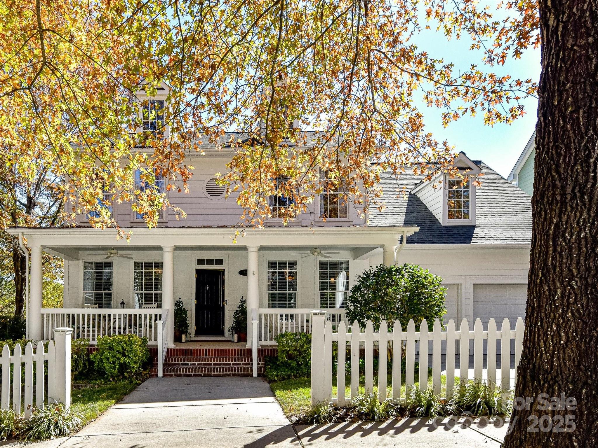 238 Fairview Lane Davidson, NC 28036 - Photo 35 of 40 front view of a house with a bench
