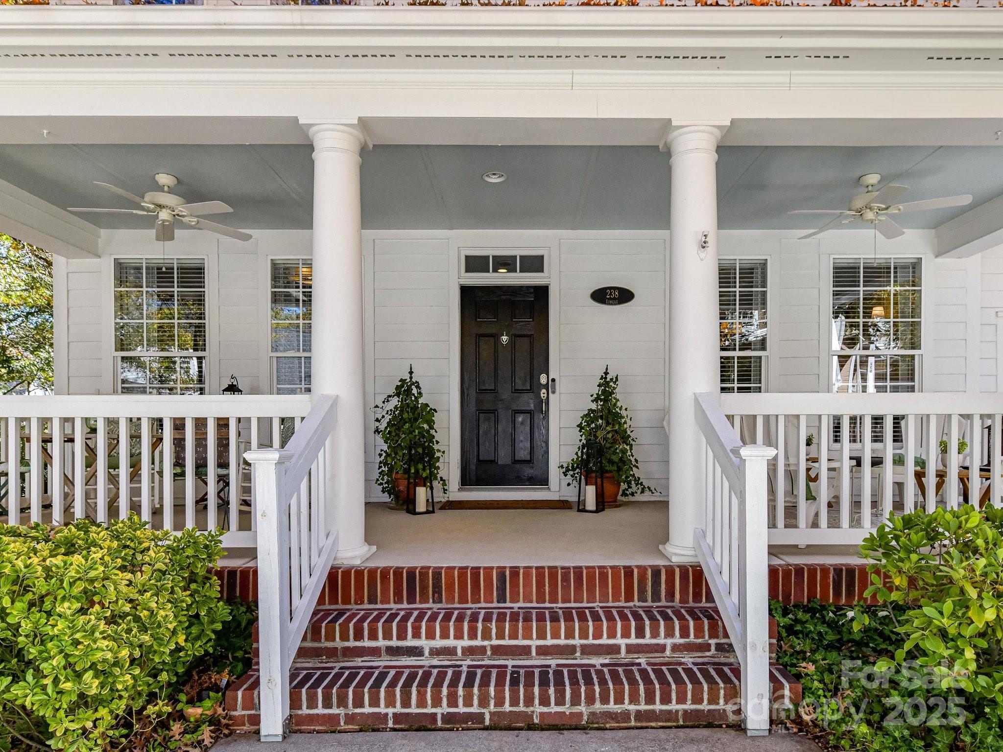 238 Fairview Lane Davidson, NC 28036 - Photo 4 of 40 front view of a house with a porch