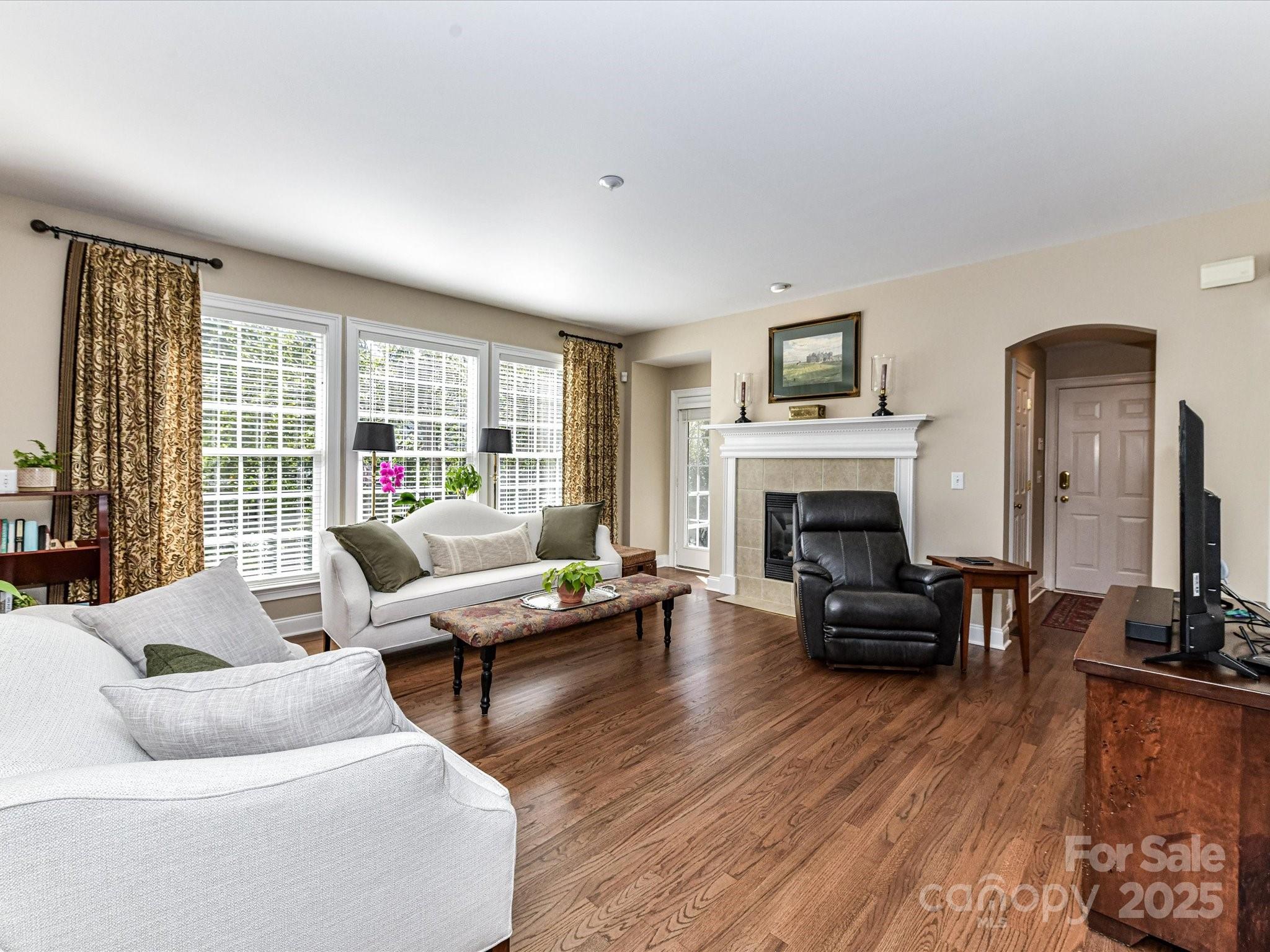 238 Fairview Lane Davidson, NC 28036 - Photo 10 of 40 a living room with furniture fireplace and a large window