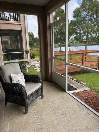 a picture of a glass door with a balcony view