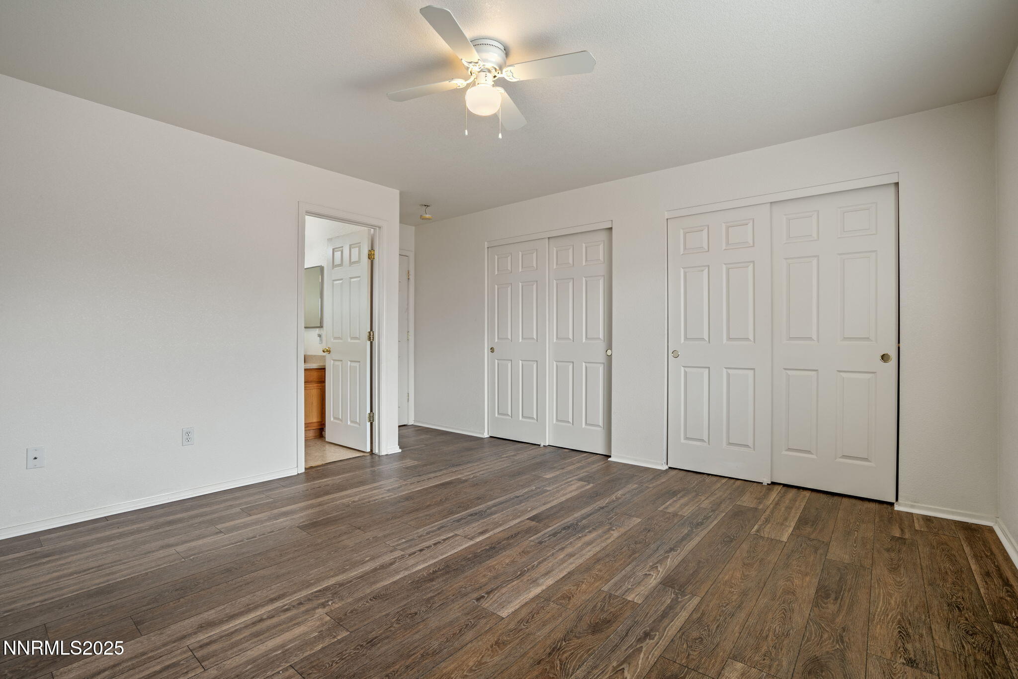 18197 Almondleaf Court Reno, NV 89508 - Photo 23 of 34 a view of an empty room with wooden floor