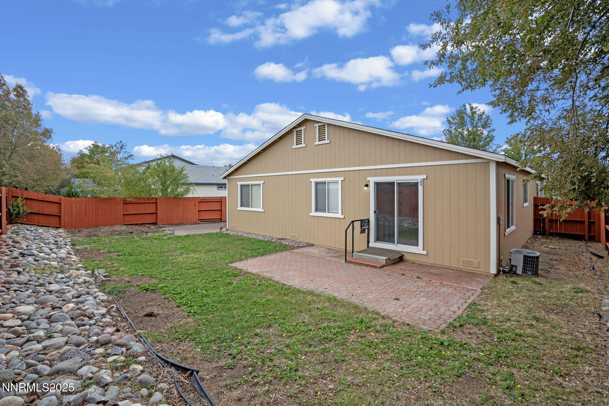 18197 Almondleaf Court Reno, NV 89508 - Photo 29 of 34 a backyard of a house with seating space