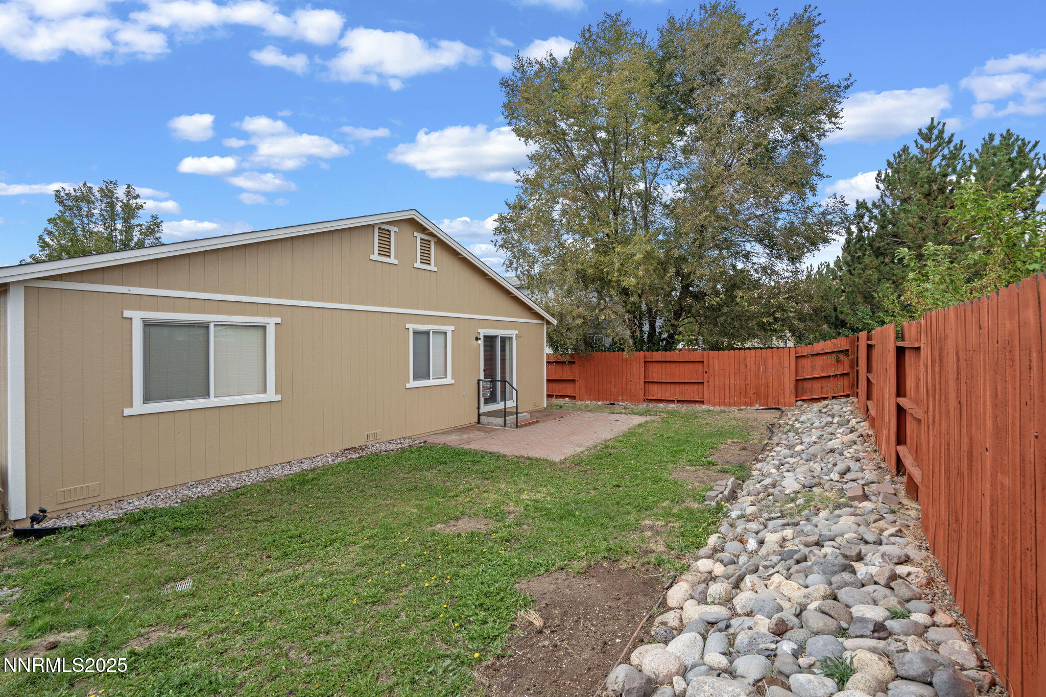 18197 Almondleaf Court Reno, NV 89508 - Photo 30 of 34 a front view of a house with garden